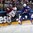 PRAGUE, CZECH REPUBLIC - MAY 12: Latvia's Lauris Darzins #10 plays the puck along the boards while France's Antonin Manavian #4 defends during preliminary round action at the 2015 IIHF Ice Hockey World Championship. (Photo by Andre Ringuette/HHOF-IIHF Images)


